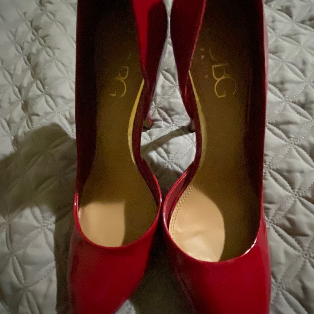 Gorgeous red BCBG red stiletto heels, size 9.